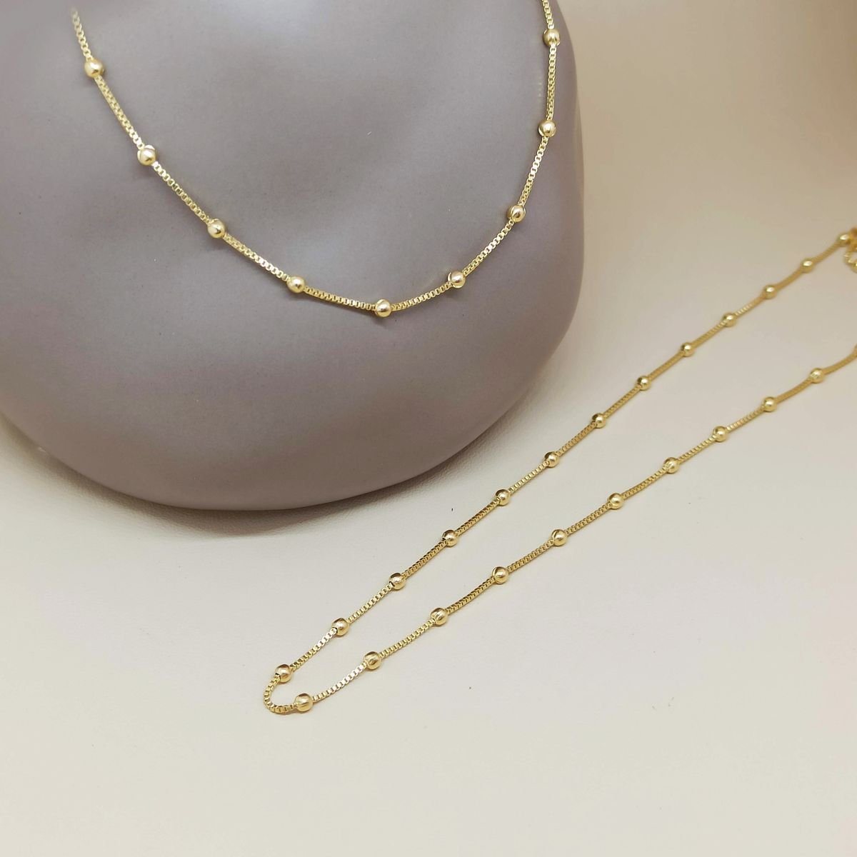 Corrente folheada a ouro com bolinhas 35+10cm 3mm