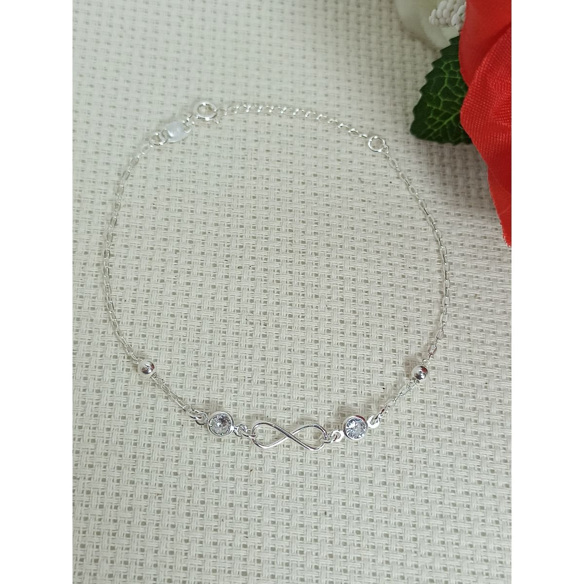 Pulseira de prata de infinito com bolinha e zirconia