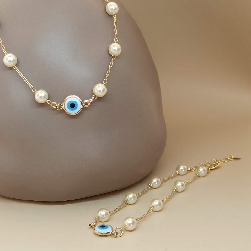 pulseira folheada a ouro de pérola e olho grego