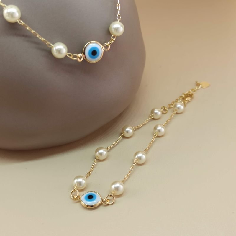 pulseira folheada a ouro de pérola e olho grego