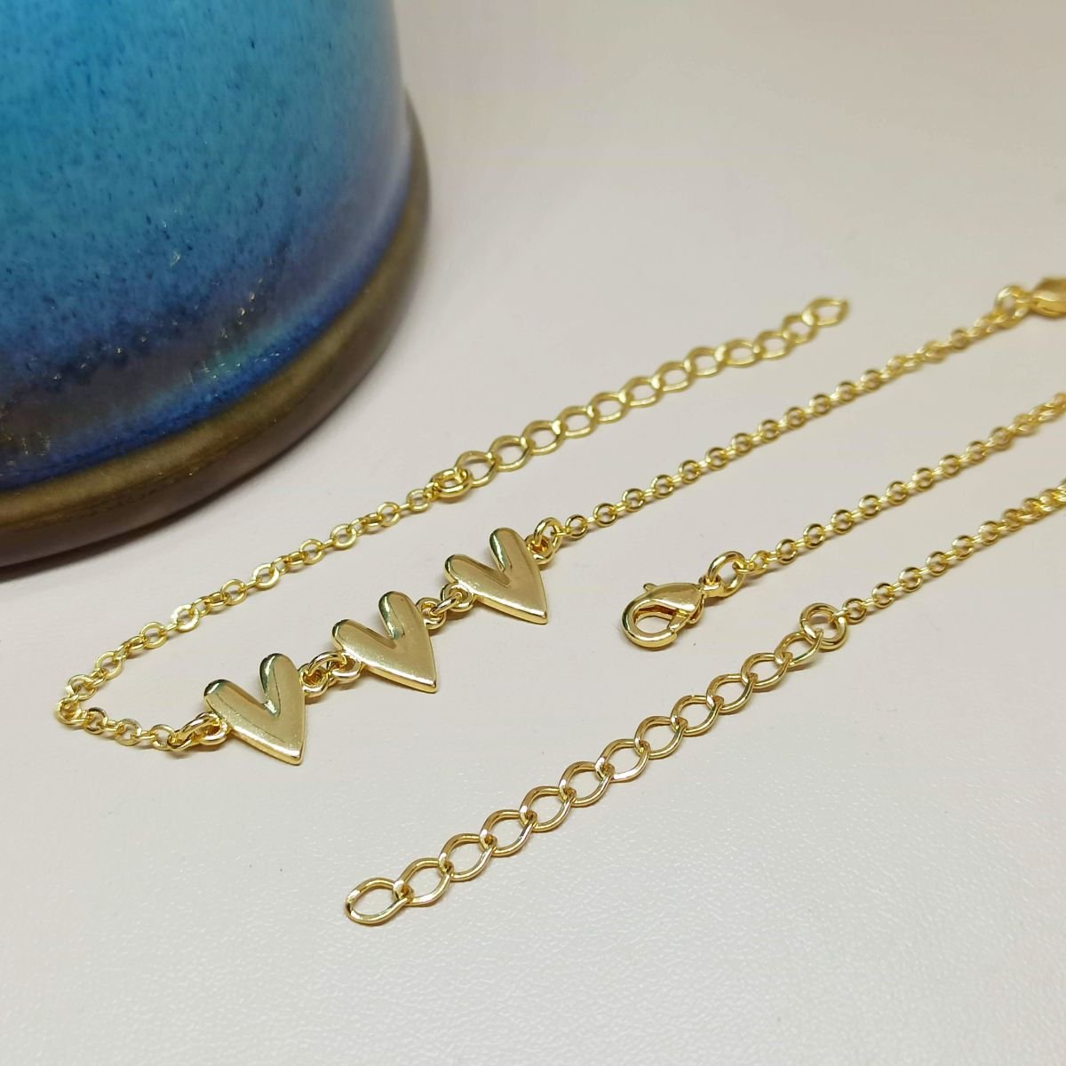 Pulseira Folheada a ouro de três corações