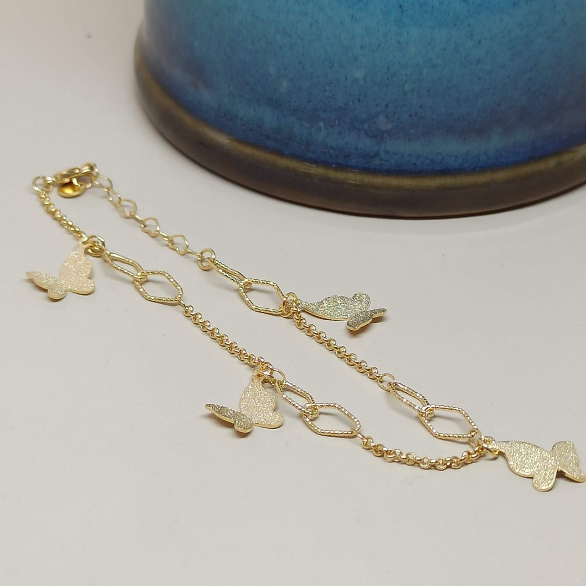 Pulseira folheado a ouro de borboletas